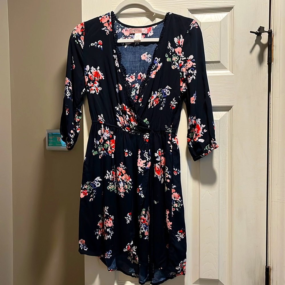 Flirty navy colored faux wrap dress